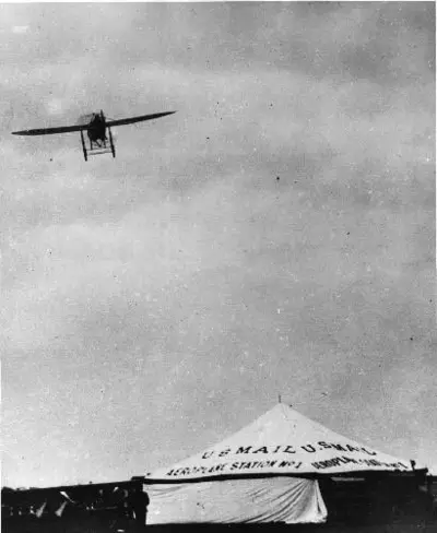 Ovington flying over U.S. Mail tent