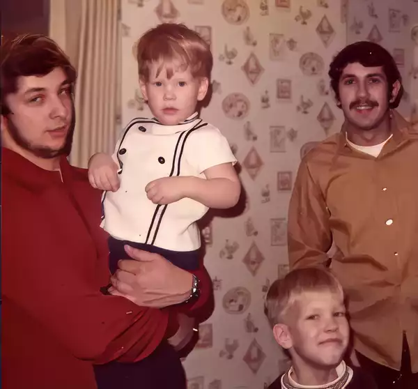Ed Jr holding Christopher with Joey closeby