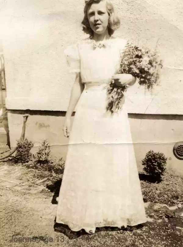 Young Joanne with flowers