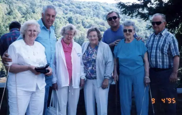 Billy Gozelski, with mother and relatives